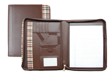 brown bonded leather zippered pad holder with plaid trim